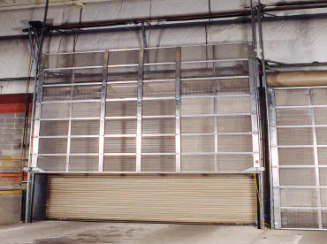 an overhead glass garage door partially open
