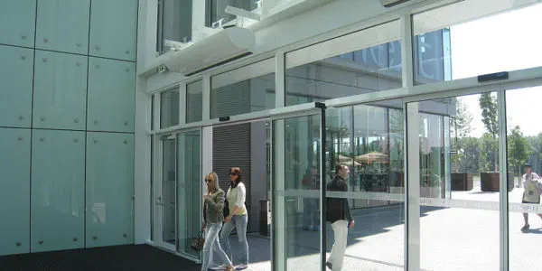 inside building looking at automatic glass doors