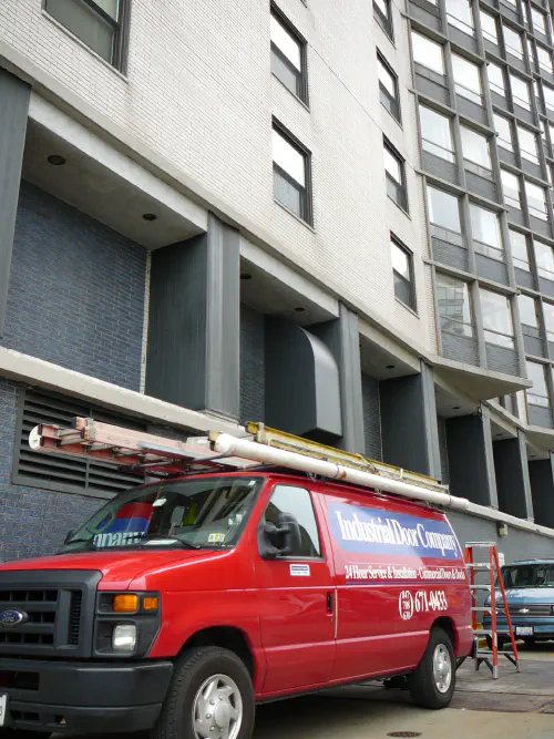 Industrial Door Company van outside building