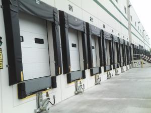 Loading dock doors with shelters installed