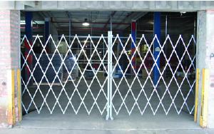 A folding gate protecting an open dock entrance