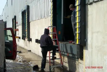 workers installing dock seals