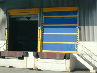 outdoor warehouse dock with rolling screen door