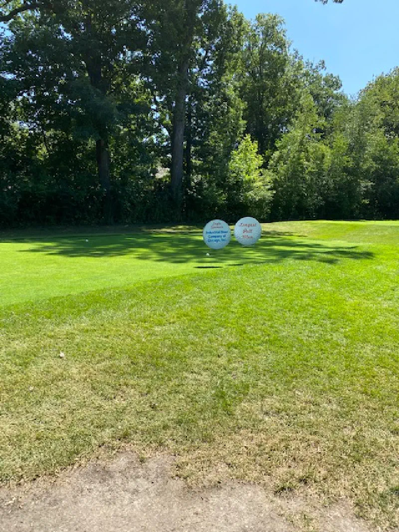 Industrial Door Company sponsorship signs at Olympia Fields Country Club